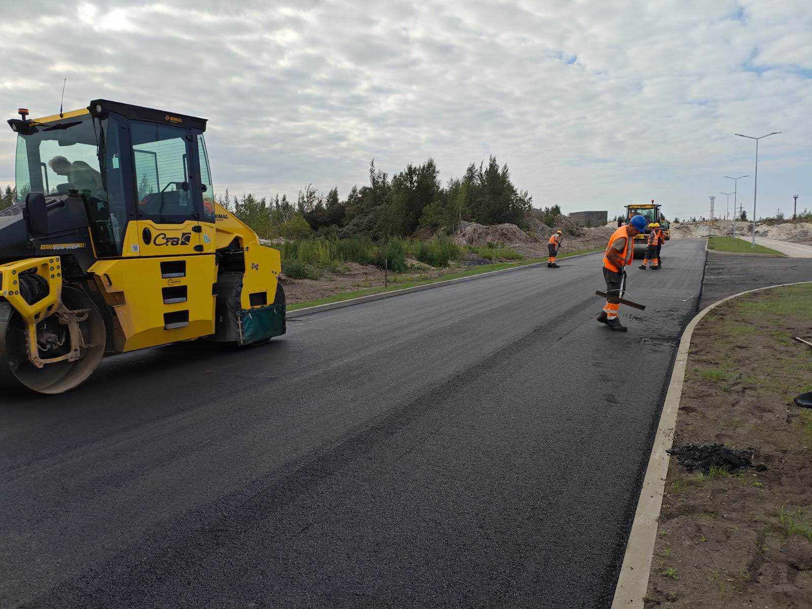 Road surfacing and finishing works